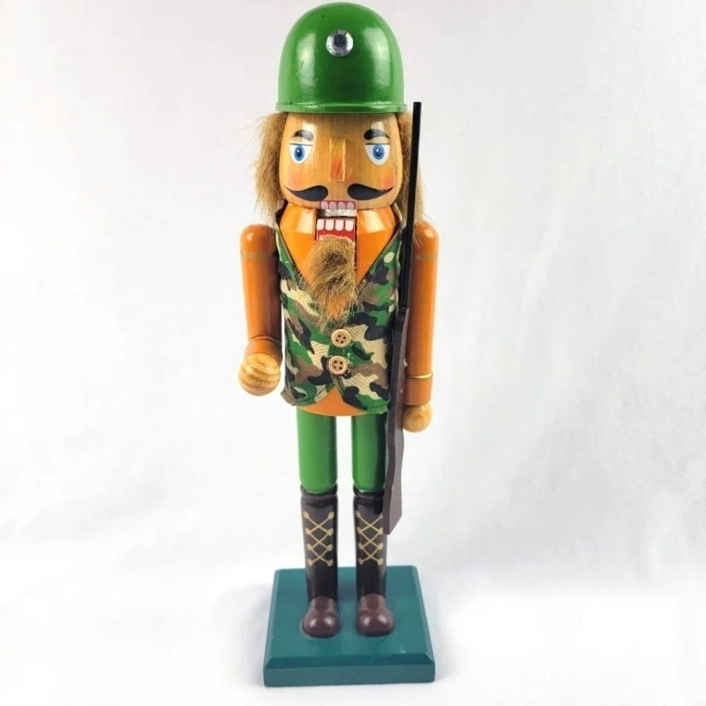 Wooden camouflage nutcracker with a rifle